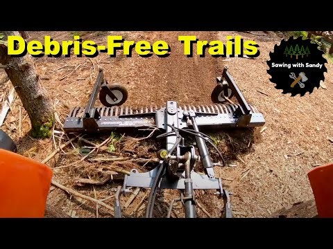 Tractor Landscape Rake and Grapple Make the Perfect Pair for Forest Cleanup