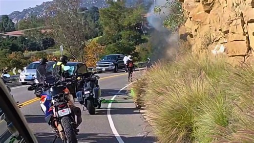 Rider hospitalized after motorcycle crash ignites San Fernando Valley brush fire