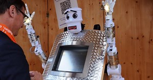 Robotic priest offers blessings in digital form