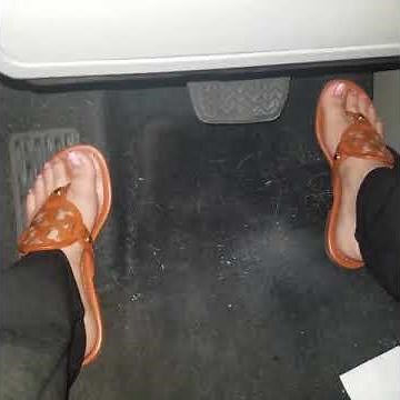 Driving in Brown Tory Burch Sandals