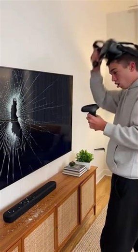VR Gamer Punches Through 65-Inch TV in Living Room Mishap 🎮💥