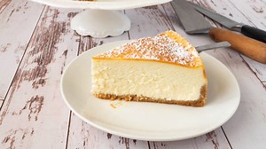 THE BEST CLASSIC CHEESECAKE - BAKED Get the recipe here - https://veenaazmanov.com/classic-cheesecake-recipe-baked/ This cheesecake recipe is rich, creamy, and velvety smooth baked over a buttery graham cracker crust. Made with full-fat cream cheese, sour cream, and eggs this classic is baked in a water bath. | Veena Azmanov