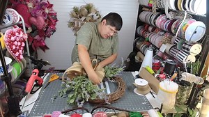 5.8K views · 257 reactions | Today, Coach Jordan is show y'all how to make a pretty lavendar grapevine wreath for spring --- and you don't even need glue! Check it out and let us know if you'll be trying this design soon. | DecoExchange | Facebook