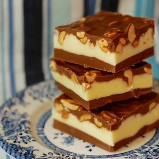 5.4K views · 43 reactions | HOMEMADE NUT GOODIE CANDY BARS! Creamy, dreamy, maple filling sandwiched between layers of chocolate, and topped with salty peanuts! Better than the original! GET THE FULL RECIPE HERE --> https://chindeep.com/2018/02/19/homemade-nut-goodie-candy-bars/ | ChinDeep | Facebook