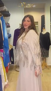 198K views · 2.4K reactions | Effortless evening elegance ✨ • Beige chiffon gown – lined, with sheer tulle sleeves and silver-gold leaf embroidery. Modest fit, perfect for hijabis. Sizes 52–58 • Powder blue 3-piece set – blouse, top, and pants. Light, elegant, and summer-perfect. Free size – fits 48–52 Luxury silhouettes made to fit beautifully.朗 Call us: 011 53445355  WhatsApp: 011 53445355  Visit: 14 Nabil El Wakkad Street – Ard El Golf | Vattci | Facebook