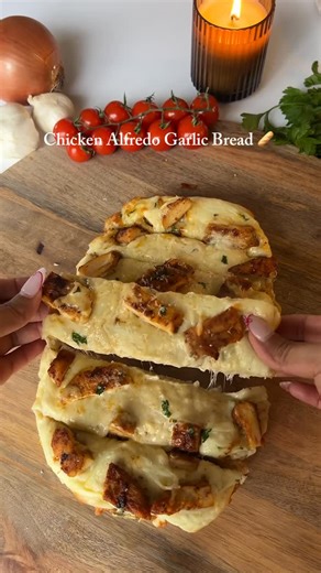 Platedbyyuri on Instagram: "Chicken Alfredo Garlic Bread 🧄🍗🧀 Ingredients Chicken • 2 chicken breasts • 1 tbsp olive oil • Salt & black pepper • 1 tsp paprika • 1 tsp garlic powder • ½ tsp onion powder Alfredo Sauce • 2 tbsp butter • 3–4 cloves garlic, minced • 1 cup heavy cream • ¾–1 cup grated Parmesan cheese • Salt & black pepper to taste Garlic Bread Base • 1 loaf French bread or Italian bread (halved lengthwise) • 4 tbsp softened butter • 2 cloves garlic, minced • 1 tbsp parsley • Mozzare