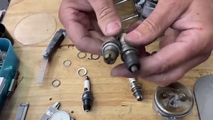 Get the most out of your quarter midget Honda engine with the right spark plug. You want the spark plug in the hole as far as you can. This puts it closer to the valve and builds compression and that equals power. You can also jet the carb for the plug for peak performance. The right spark plug and jet can make all the difference and having a dyno helps the process along. #leveltheplayingfield #krywheel #truthmatters #fixtherules #fixthetimingrule #fixthecamtimingrule #fixthetirerule #fixtheflyw