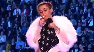 Miley Cyrus -- Lights Up Joint ON-STAGE at MTV EMAs ... Because She Can