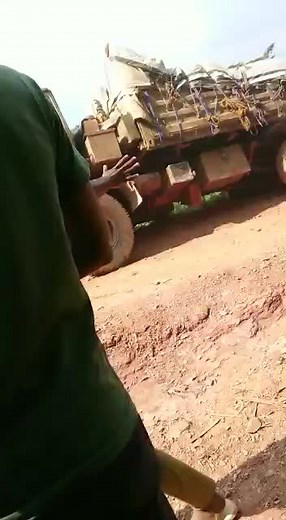 Overturned Truck Rescue Efforts in Rural Area