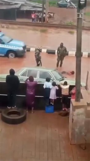 Power drunk military officers make driver swim in flood for driving and splashing them water on a very wet road | Edo Updates