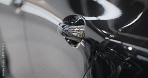 Close up of the shiny car details after polishing and waxing, car detaling center, automotive care, 4k 60p