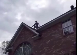 Guy tries to jump into pool from roof.. doesn’t quite make it..