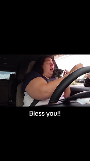 Uncontrollable Sneezing Fit by a Woman