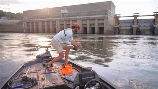 Giant hundred pound fish almost pulls angler into dam waters