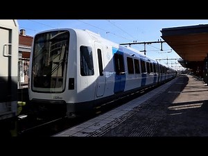 Tågab Rc2 med ny C30 till Stockholms tunnelbana passerar Hässleholm
