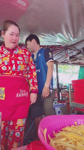 Food Preparation with Cartoon-Themed Apron