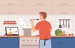 Watch video recipe. Man cooking at kitchen using online chef courses. Preparing food by tutorial, distance learning at home vector concept