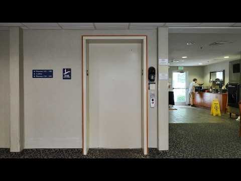 Hazelton, WV: Steps and Otis Hydrauilc Elevator at the Microtel by Wyndham