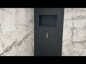 Wet room shower tray installation.