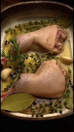 **Duck Confit 🦆: A Taste of French Elegance!** **Ingredients:** - 4 x 250g / 8oz duck legs (skin on, bone in) - 750 ml / 25 oz duck fat - 4 tsp cooking/kosher salt - 1/3 cup thyme sprigs (lightly packed) - 1/3 cup sage sprigs (lightly packed) - 1/3 cup rosemary sprigs (lightly packed) - 1/3 cup oregano sprigs (lightly packed) - 6 cloves garlic (smashed with skin on) - 1 eschalot (shallot), peeled and sliced 0.7cm (1/3") thick - 1 tbsp black peppercorns - 1 tbsp coriander seeds - 8 star anise - 