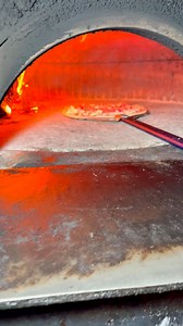 Caught feelings… for pizza. Wood-fired, hand-tossed, and straight outta downtown Denver at Marco’s! 🍕😋 #pizza #nystylepizza #fyp #viral #trending #asmr | The Munchies