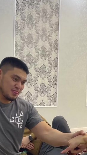 Exciting Arm-Wrestling Match Between Two Friends