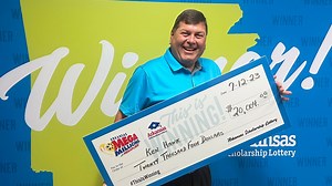 Sherwood man celebrates $20,004 lottery win