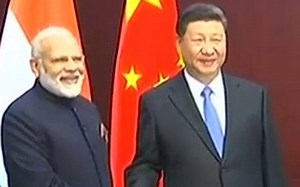 PM Modi meets China's Jingping on sidelines of SCO summit is Astana