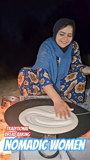 «Nomadic life: Baking bread over a fire with a nomadic woman» #Nomads​ #Traditional_Bread​ #Bread​​