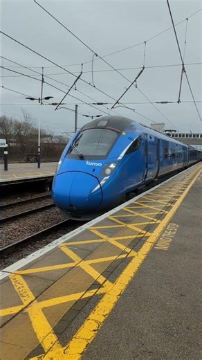 Lumo Class 803 (803001) passing Newark Northgate Train Station