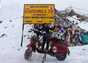 WATCH: Determined Singaporean lady rides her Vespa across the world’s most dangerous roads | Coconuts