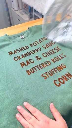 foil shirts are my absolute favorite and this gorgeous green crew neck sweater from @shirtspace was begging for this bronze foil! You can save $3 on shipping with shirtspace with code CBCRAFTS3 #turkeyday #shirtspace #foilhtv #cricutprojects #holidayshirt #sidechick #sidedishes #funnyshirts #shirtstory #customshirt #crewneck #oversizedcrewneck #thanksgiving | Corinne Blackstone