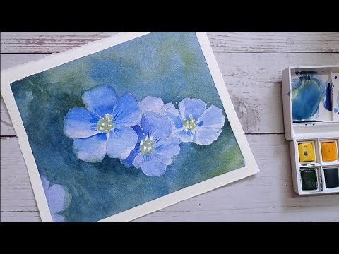 Watercolor blue flax flower painting for beginners with step-by-step instructions.