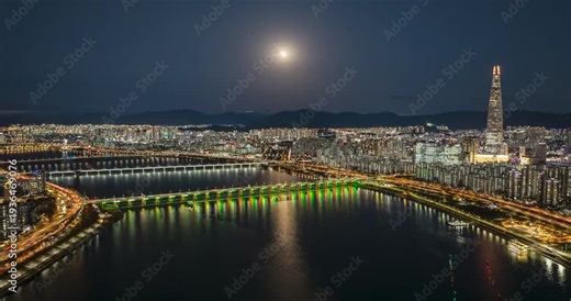 Hyperlapse of Total Lunar Eclipse Blood Moon over Lotte World Tower and Seoul Cityscape