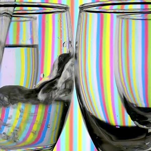 Here's a fun experiment for your Sunday: Light waves will change speed and direction when they pass through multiple substances. This effect is called refraction. In this case, the varying densities of air, glass, and water cause the light to "bend" when viewed through water. G'head, give it a try and tag us in the results. #SatisfyingSunday 🌈 | Science Channel