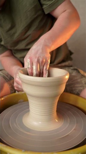 Throwing a handmade ceramic bowl