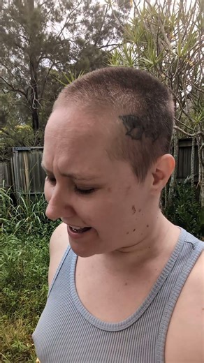 Singing Wildflower by Billie Eilish in the backyard.