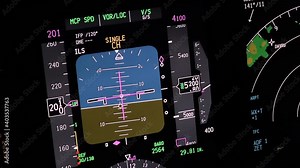 Flight instruments display of a modern passenger airplane flying at night. Actual cockpit footage. Aircraft is descending for landing.