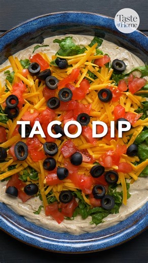 This easy taco dip is a refreshing change of pace from the typical queso dip! Full recipe here: bit.ly/3ZiXHgF | Taste of Home
