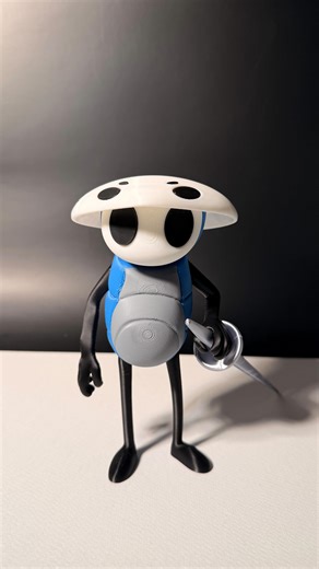 Crescent Reverie on Instagram: "Curious traveler Quirrel—pack, nail, and endless wonder 🌀✨ Once a student of the Teacher, now roaming Hallownest. My crew’s growing strong… who should join next? #hollowknight #quirrel #3dprint #hollowknightart #gamingcommunity #fanmade #diycrafts #handmadedesign #indiegamers #miniatures #3dprintinglife #gamersofinstagram #makersmovement #gameart #hollowknightfanart #figuresculpture #printlife #creativeprocess #artofmaking #designinspired #3dartistsoninstagram #c