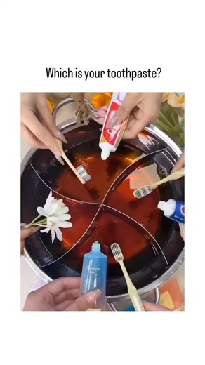 Crazy Filmyhub on Instagram: "The X post features a 34-second video by Indonesian influencer @wqqx_1 comparing four toothpastes—Colgate, Pepsodent, Close-Up, and premium Dentiste—in a divided pan of red liquid simulating stains on model teeth, demonstrating Dentiste's superior cleaning by fully whitening its section while others leave residue. This format mirrors viral marketing trends for niche brands like Korean Busaurus, where staged tests exaggerate differences; Dentiste's high RDA value of