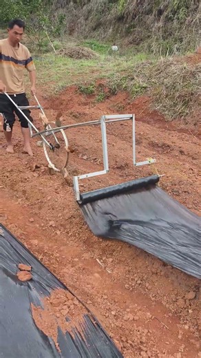 Farmers make their own tools for laying plastic film and drilling holes