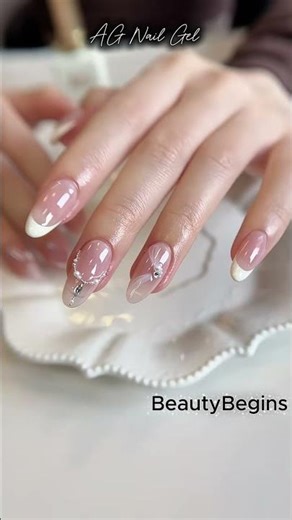 Artistic nail sculpting with rhinestone embellishm