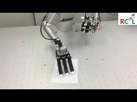 Dual Arm Robot: pick up a piece of paper