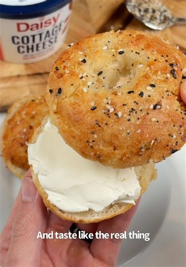 Say “YUM” if you would eat these Healthy High Protein Cottage Cheese Bagels 🥯🙌 Recipe ⬇️ What you need: 1 cup almond flour (or flour of choice) 3/4 cup cottage cheese 1 tsp baking powder 1 tbsp everything bagel seasoning How to make it: 1. Combine the flour & baking powder. 2. Mix with the cottage cheese and knead into a dough. Add more flour as needed until firm. 3. Form into 3-4 bagels. Brush with butter. Add the seasonings. 4. Air fry @ 350F for 10-15 mins. Take them out & enjoy! Pro tip: I