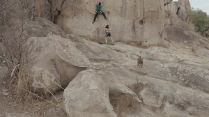 Man and woman in nature practicing mountaineering - Free Stock Video