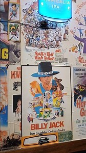 BARBARELLA and BILLY JACK movie posters at M.L. ROSE PUB in Murfreesboro. Tennessee.