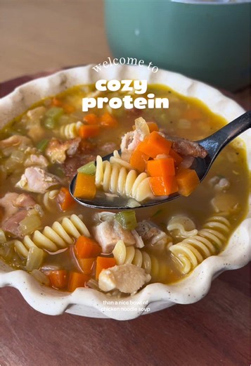 Cozy Protein, Episode 1: Chicken noodle soup 51g of protein; serves 2 2 boneless, skin on chicken thighs 1 carrot, small diced 1 stalk celery, small diced 1/2 white onion, small diced 4 cloves garlic, minced 3-4 sprigs thyme 1 bay leaf 4 cups chicken bone broth 1 tbsp chicken better than bouillon 4 oz protein pasta #highproteinmeals #easyhighproteinmeals #cozymeals #chickennoodlesoup
