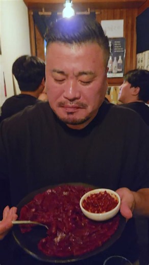 A shot of soju with mungtigi