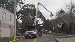 Crews working through the storm in St. Augustine to remove fallen trees from power lines